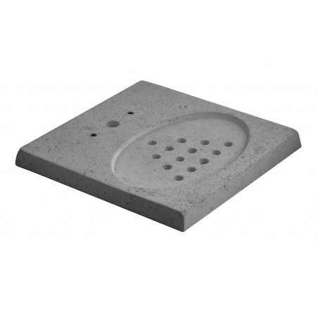 Perforierter grauer Betonsockel mit Abflussgitter für Aquapoint-Bodenbrunnen