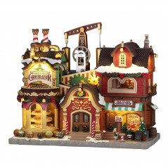 The Holly Jolly Chocolatier & Mrs. Claus Coffee Shop con Alimentatore 4.5V Cod. 65521