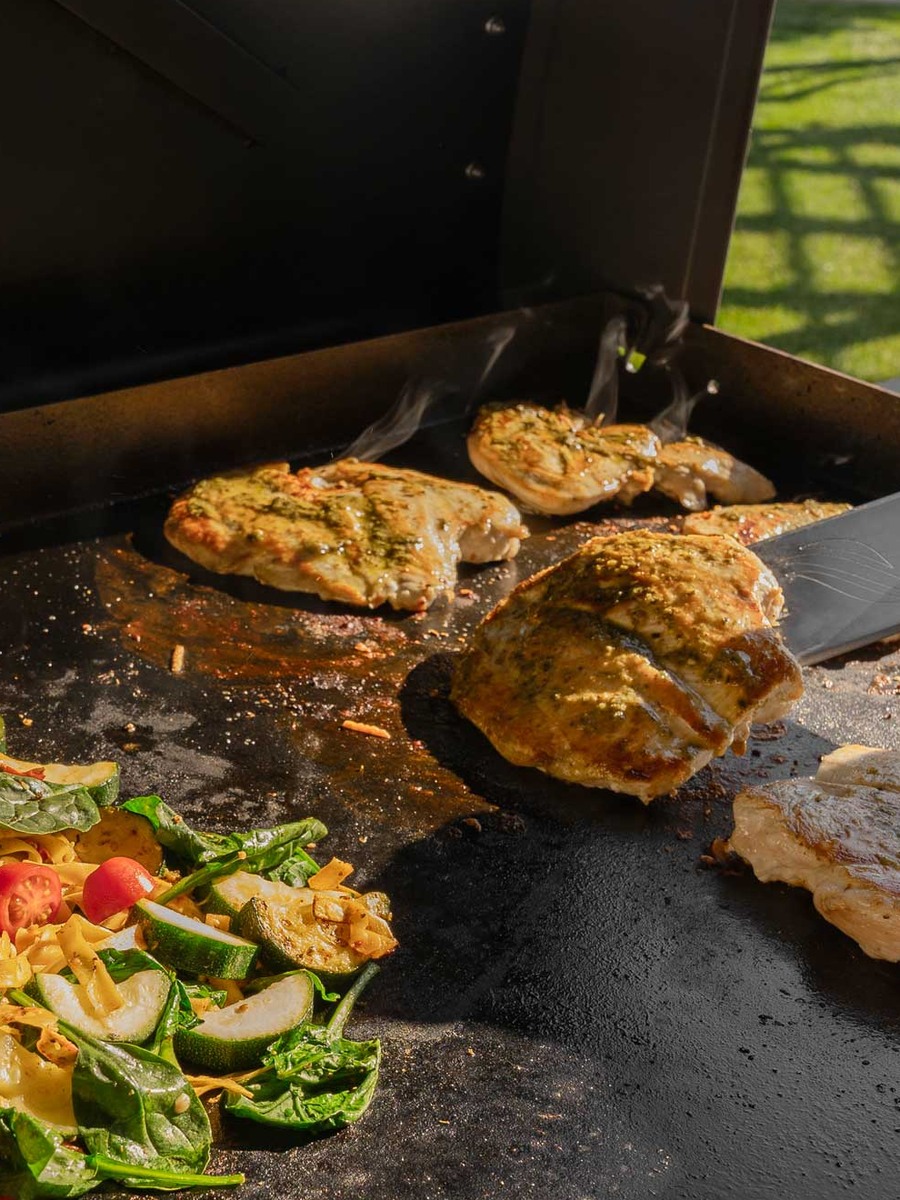 Cooking on a Blackstone gas griddle - close-up