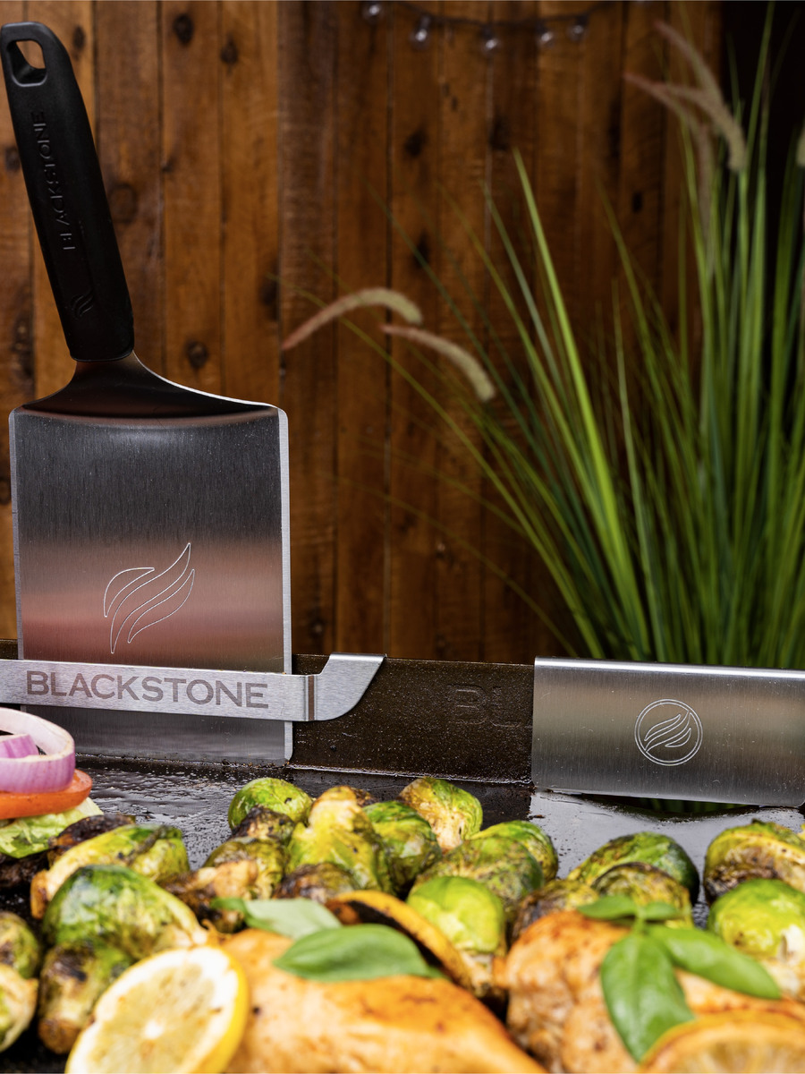 Grease outlet barrier and tool holder kit Blackstone in use