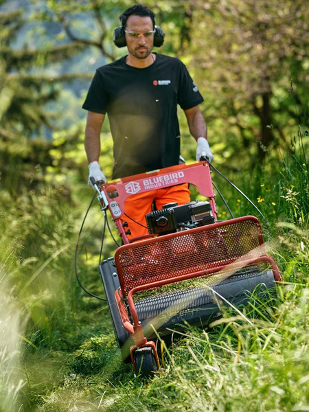 Mowing with a Blue Bird flail mower.